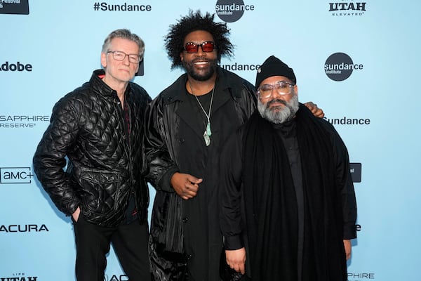 Derik Murray, from left, Ahmir "Questlove" Thompson and Joseph Patel attend the premiere of "Sly Lives!" during the Sundance Film Festival on Thursday, Jan. 23, 2025, at the Library Center Theatre in Park City, Utah. (Photo by Charles Sykes/Invision/AP)