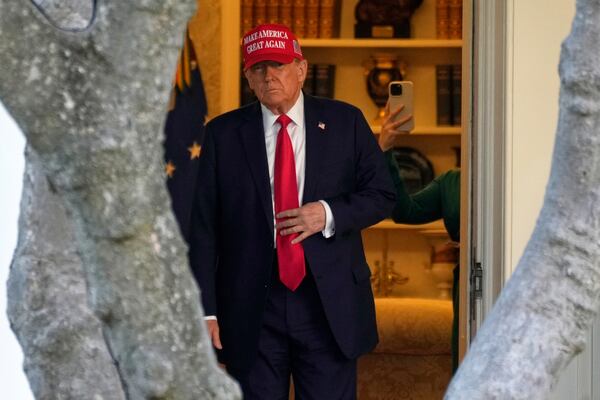 FILE - President Donald Trump walks from the Oval Office to depart on Marine One on the South Lawn of the White House in Washington, Feb. 28, 2025. (AP Photo/Ben Curtis, File)