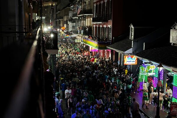 Philadelphia Eagles fans celebrate on Bourbon Street in New Orleans Sunday, Feb. 9, 2025, after winning NFL football's Super Bowl 59. (AP Photo/Stephen Smith)