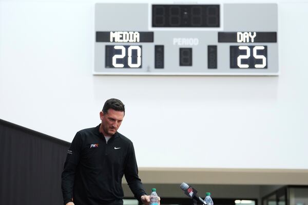 Phoenix Mercury head coach Nate Tibbetts arrives for a news conference during Mercury Media Day at the team's WNBA basketball training facility, Wednesday, April 30, 2025, in Phoenix. (AP Photo/Ross D. Franklin)