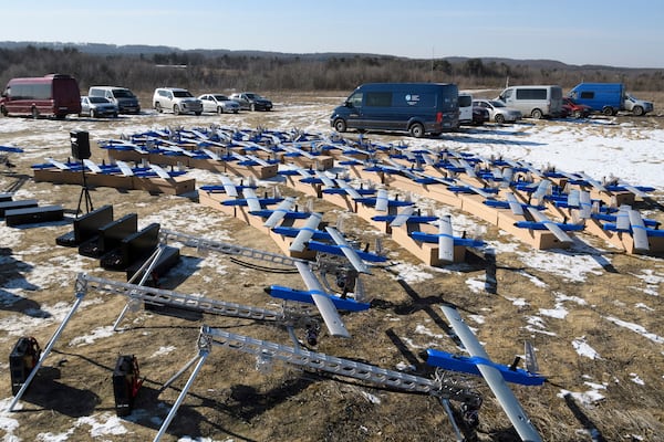 Ukrainian-made fixed-wing Besomar 3210 drone interceptors are handed over to the Armed Forces by Kozytskyi Charity Foundation in an undisclosed location in the Lviv region, western Ukraine, Friday, Feb. 21, 2025. (AP Photo/Mykola Tys)