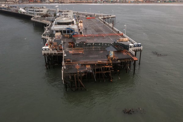 Damage to the Santa Cruz Wharf is seen in Santa Cruz, Calif., Tuesday, Dec. 24, 2024. (AP Photo/Nic Coury)