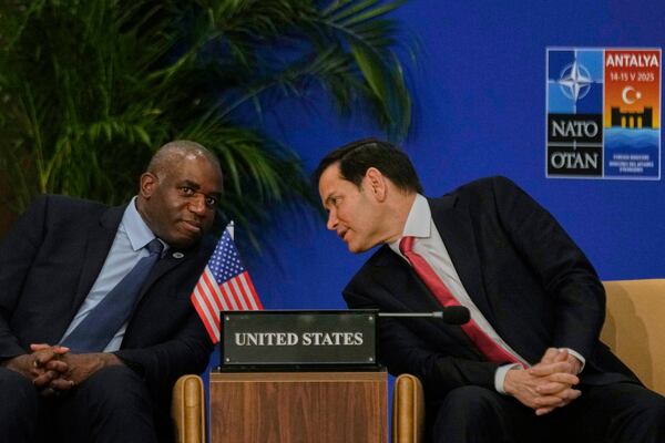 United States Secretary of State Marco Rubio, right, talks to British Foreign Secretary David Lammy during an informal meeting of NATO's foreign ministers in Antalya, southern Turkey, Thursday, May 15, 2025. (AP Photo/Khalil Hamra)