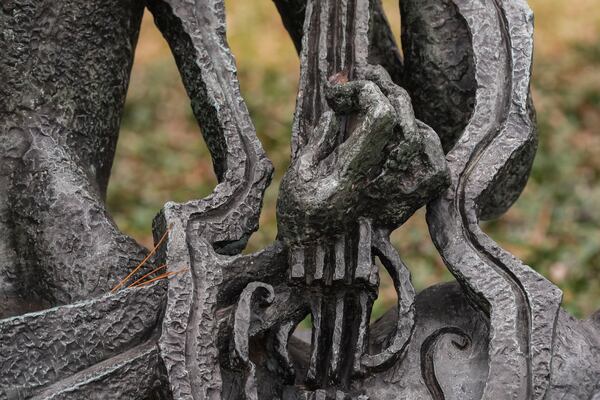 A detail of La Poetesse, bronze, 1953, by Ossip Zadkine is seen in the Sydney and Walda Besthoff Sculpture Garden in City Park in New Orleans, Wednesday, Jan. 29, 2025. (AP Photo/Gerald Herbert)