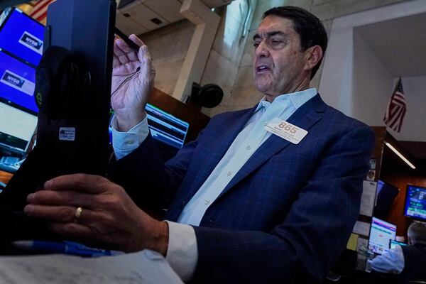 Trader Mark Muller works on the floor of the New York Stock Exchange, Monday, May 12, 2025. (AP Photo/Richard Drew)