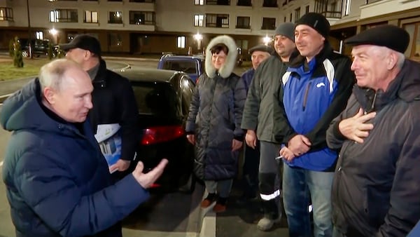 FILE - In this image made from video released by Russian TV Pool on March 19, 2023, Russian President Vladimir Putin talks with residents during his visit to Mariupol in the Russian-controlled Donetsk region of eastern Ukraine. (Pool Photo via AP, File)