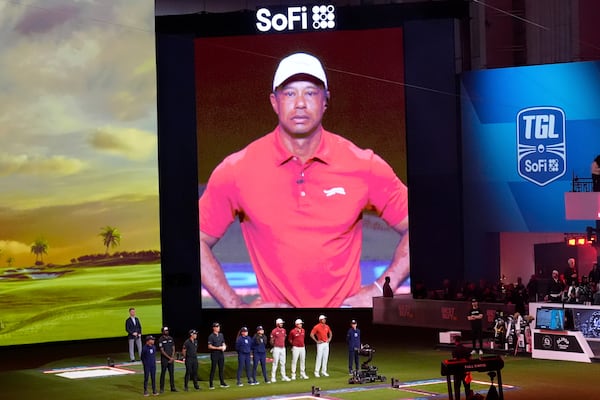 Tiger Woods is introduced before the start of Los Angeles Golf Club and his Jupiter Links Golf Club, Tuesday, Jan. 14, 2025, in Palm Beach Gardens, Fla. (AP Photo/Marta Lavandier)