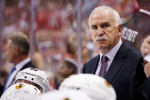 FILE - Chicago Blackhawks head coach Joel Quenneville watches from the bench in the third period of an NHL hockey game against the Washington Capitals, Thursday, Oct. 15, 2015, in Washington.. (AP Photo/Alex Brandon, File)