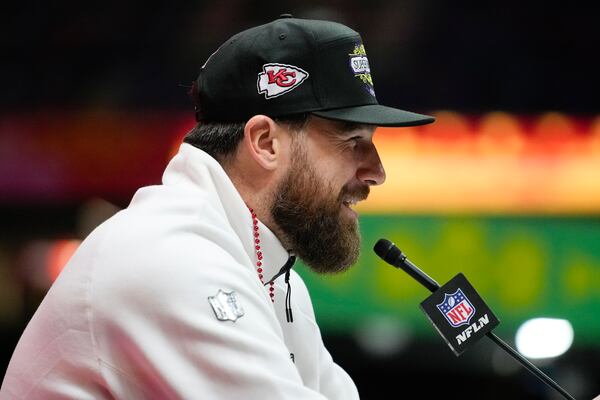 Kansas City Chiefs tight end Travis Kelce (87) participates during Super Bowl 59 Opening Night, Monday, Feb. 3, 2025, in New Orleans, ahead of the NFL football game between the Philadelphia Eagles and the Kansas City Chiefs Sunday. (AP Photo/Matt York)