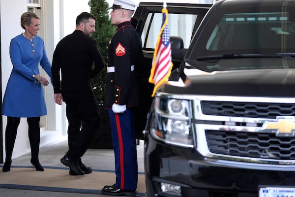 Ukrainian President Volodymyr Zelenskyy, center, departs after a meeting with President Donald Trump at the White House, Friday, Feb. 28, 2025, in Washington. (AP Photo/Evan Vucci)