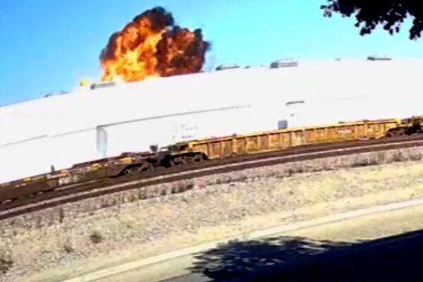 This image taken from video, shows an explosive fire as a small plane crashes into a commercial building in Fullerton, Calif. on Thursday, Jan. 2, 2025. (RUCCI FORGED via AP)