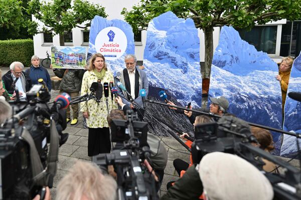 Lawyer Roda Verheyen speaks to journalists before the verdict is announced in the hearing of a climate lawsuit brought by Peruvian mountain farmer that glaciers above his hometown of Huaraz are melting due to German energy company RWE greenhouse gas emissions, at Hamm Higher Regional Court, in Hamm, Germany, Wednesday, May 28, 2025. (Bernd Thissen/dpa via AP)