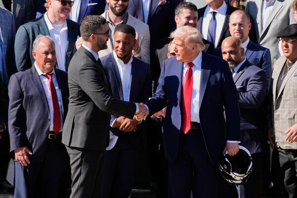 President Donald Trump, right, shakes the hand of Philadelphia Eagles coach Nick Sirianni, as Trump welcomes the Super Bowl champion NFL football team to the South Lawn of the White House, Monday, April 28, 2025, in Washington. (AP Photo/Alex Brandon)