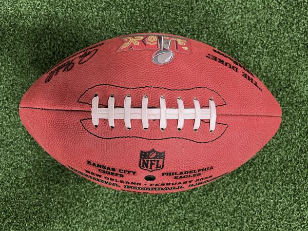 One of the official balls for the NFL Super Bowl football game is seen at the Wilson Sporting Goods football factory, Monday, January 27, 2025, in Ada, Ohio. (AP Photo/Patrick Aftoora-Orsagos)