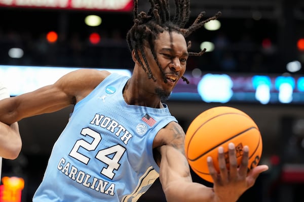 North Carolina forward Jae'Lyn Withers rebounds during the first half of a First Four college basketball game against San Diego State in the NCAA Tournament, Tuesday, March 18, 2025, in Dayton, Ohio. (AP Photo/Jeff Dean)