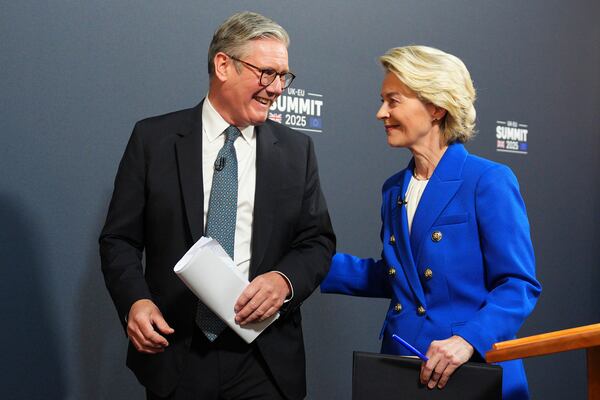 Britain's Prime Minister Keir Starmer, left, and European Commission President Ursula von der Leyen smile as they leave at the end of a joint press conference with European Council President Antonio Costa following a United Kingdom and European Union summit at Lancaster House, London, Monday, May 19, 2025. (Carl Court/Pool Photo via AP)
