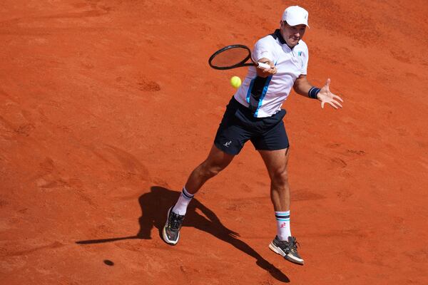 Serbia's Dusan Lajovic in action against Spain's Carlos Alcaraz during the Italian Open tennis tournament in Rome, Friday May 9, 2025. (Alfredo Falcone/LaPresse via AP)