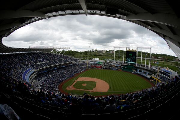 FILE - Fans watch during a baseball game between the Kansas City Royals and the Minnesota Twins Sunday, April 30, 2017, in Kansas City, Mo. (AP Photo/Charlie Riedel, File)