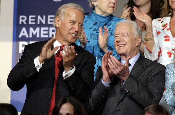 FILE - Former President Jimmy Carter and Sen. Joe Biden, D-Del., at the Democratic National Convention in Denver, Aug. 26, 2008. (AP Photo/Paul Sancya, File)