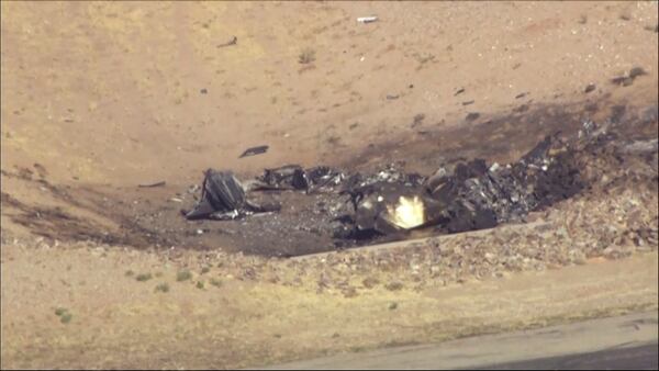 In this image taken from video, plane debris seen from above at Marana Regional Airport after a deadly crash in Marana, Ariz. on Wednesday, Feb 19, 2025. (KNXV via AP)