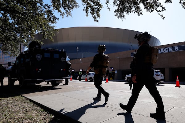 Local SWAT teams patrol outside the Ceasars Superdome ahead of the Sugar Bowl NCAA College Football Playoff game, Thursday, Jan. 2, 2025, in New Orleans. (AP Photo/Butch Dill)