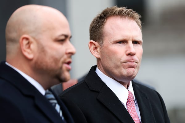 Andrew Giuliani looks on while attorney Joseph Cammarata speaks to the press outside of federal court, Thursday, Jan. 16, 2025, in New York. (AP Photo/Heather Khalifa)