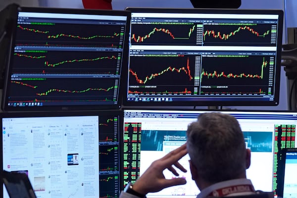 A trader works on the floor of the New York Stock Exchange, Tuesday, Feb. 4, 2025. (AP Photo/Richard Drew)