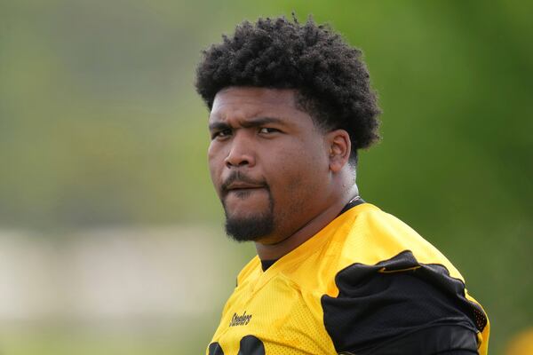 Pittsburgh Steelers first round draft pick Derrick Harmon (99) looks on during the NFL football team's rookie camp in Pittsburgh, Friday, May 9, 2025. (AP Photo/Gene J. Puskar)