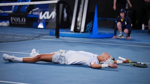 Holger Rune of Denmark celebrates after defeating Miomir Kecmanovic of Serbia in their third round match at the Australian Open tennis championship in Melbourne, Australia, Sunday, Jan. 19, 2025. (AP Photo/Vincent Thian)