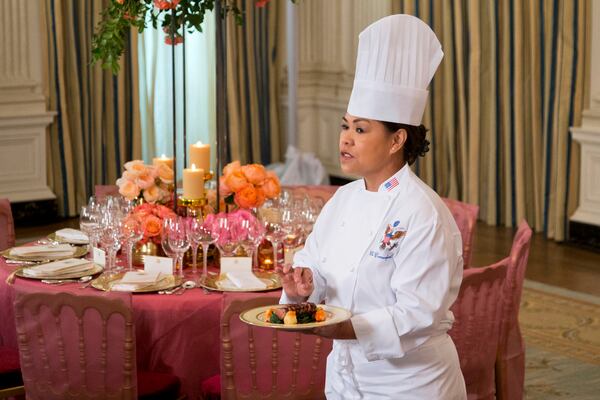 FILE - White House executive chef Cristeta Comerford shows the main course during a preview in the State Dining Room of White House in Washington, Sept. 24, 2015, for the state dinner of the visiting Chinese President Xi Jinping. (AP Photo/Manuel Balce Ceneta, File)