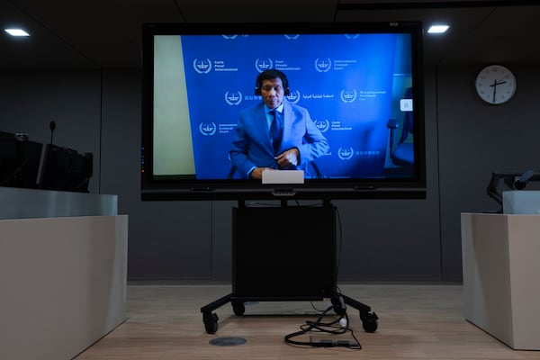 Former Philippine President Rodrigo Duterte is seen on a screen in the courtroom of the International Criminal Court (ICC) in The Hague, Netherlands, Friday, March 14, 2025. (AP Photo/Peter Dejong, Pool)