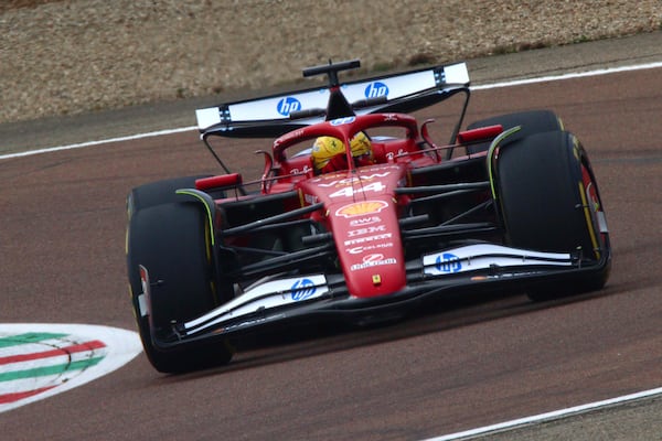 Ferrari driver Lewis Hamilton drives the new Ferrari SF-25 at Fiorano circuit, near Maranello, Italy, Wednesday Feb. 19, 2025. (Davide Gennari/LaPresse via AP)