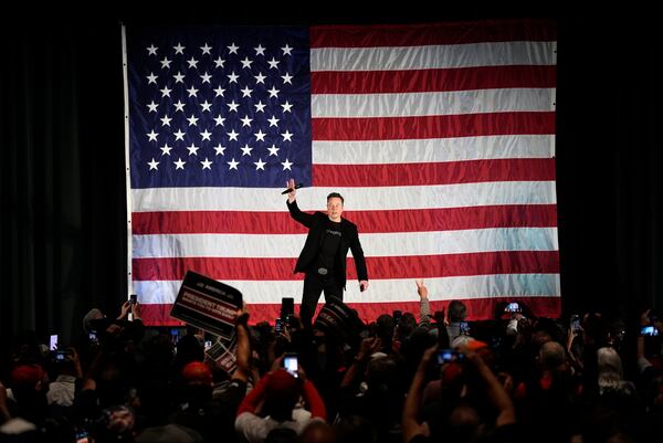 FILE - Elon Musk speaks as part of a campaign town hall in support of Republican presidential nominee former President Donald Trump in Folsom, Pa., Thursday, Oct. 17, 2024. (AP Photo/Matt Rourke, File)