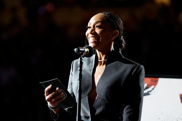 A'ja Wilson attends a ceremony to retire her number before an NCAA college basketball game between South Carolina and Auburn in Columbia, S.C., Sunday, Feb. 2, 2025. (AP Photo/Nell Redmond)