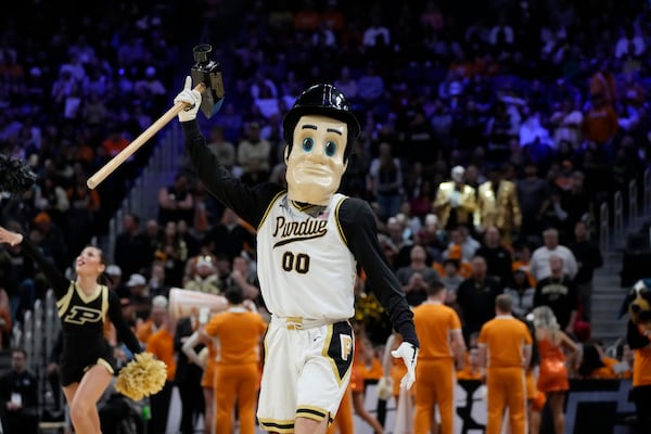 Purdue Pete, the Purdue mascot, performs during the first half of an Elite Eight college basketball game against Tennessee in the NCAA Tournament, Sunday, March 31, 2024, in Detroit. (AP Photo/Paul Sancya)