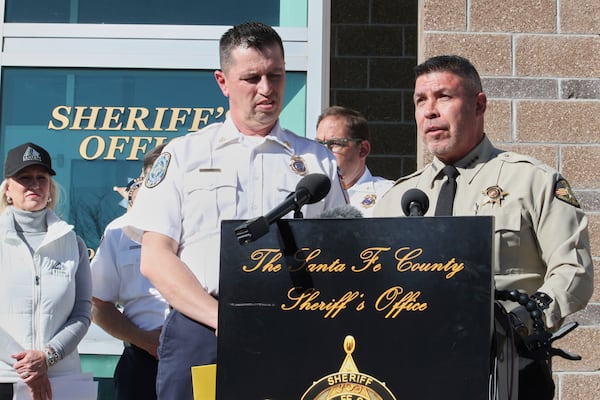 Santa Fe County Sheriff Adan Mendoza, right, and Santa Fe Fire Chief Brian Moya answer questions about the investigation into the deaths of actor Gene Hackman and his wife Betsy Arakawa during a news conference in Santa Fe, N.M., Friday, Feb. 28, 2025. (AP Photo/Susan Montoya Bryan)