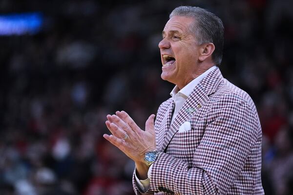 Arkansas head coach John Calipari calls to his players during the first half in the second round of the NCAA college basketball tournament, Saturday, March 22, 2025, in Providence, R.I. (AP Photo/Charles Krupa)