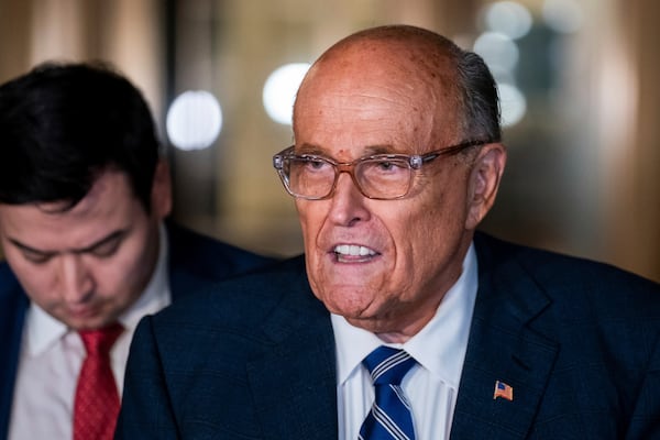 Rudy Giuliani speaks to the media outside of Manhattan federal court in New York, on Friday, Jan. 3, 2025. (AP Photo/Adam Gray)