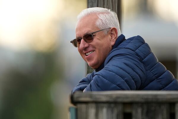 Trainer Todd Pletcher watches a workout at Churchill Downs Monday, April 28, 2025, in Louisville, Ky. (AP Photo/Charlie Riedel)