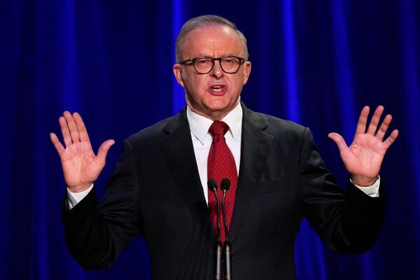 Australian Prime Minister Anthony Albanese reacts as he addresses the party faithful after winning a second term following the general election in Sydney, Saturday, May 3, 2025. (AP Photo/Rick Rycroft)