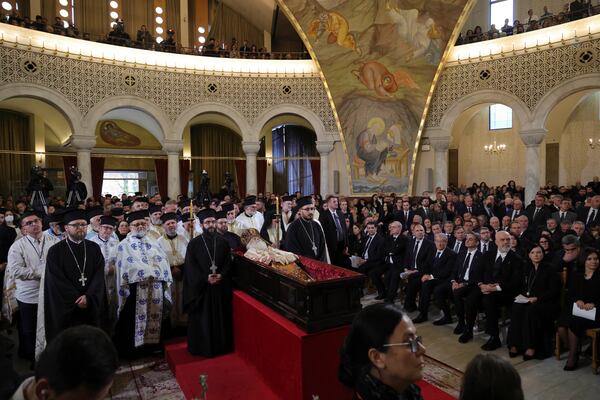 People attend the funeral of the late Archbishop Anastasios of Tirana, Durres and All Albania, at the Cathedral of the Resurrection of Christ, in Tirana, Albania, Thursday, Jan. 30, 2025. (AP Photo/Vlasov Sulaj)