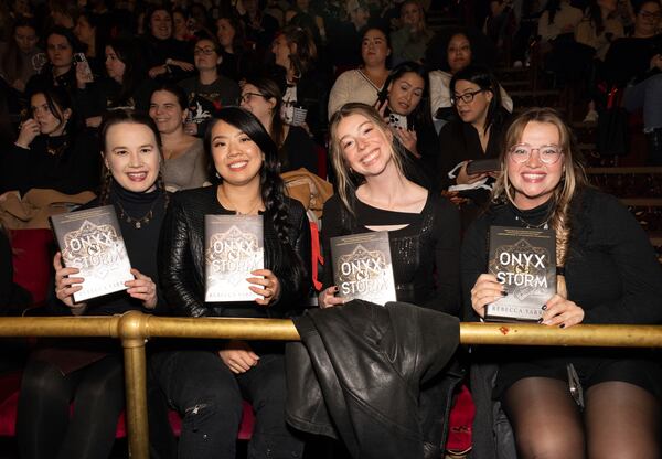 Audience members attend author Rebecca Yarros in conversation of her new book "Onyx Storm" at The Town Hall on Friday, Jan. 24, 2025, in New York. (Photo by CJ Rivera/Invision/AP)