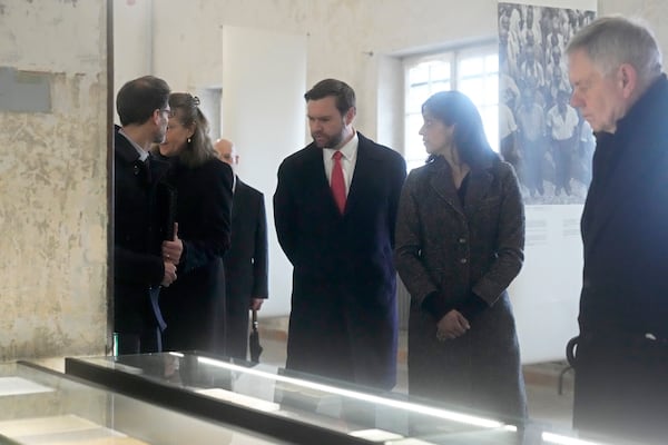 U.S. Vice President JD Vance and second lady Usha Vance visit the Dachau Concentration Camp Memorial Site outside Munich, Germany, Thursday, Feb. 13, 2025. (AP Photo/Matthias Schrader)