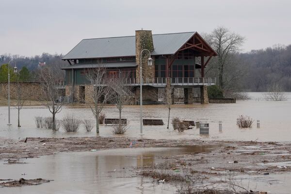 Water from the Cumberland River rises out of its banks Sunday, Feb. 16, 2025, in Clarksville, Tenn. (AP Photo/George Walker IV)