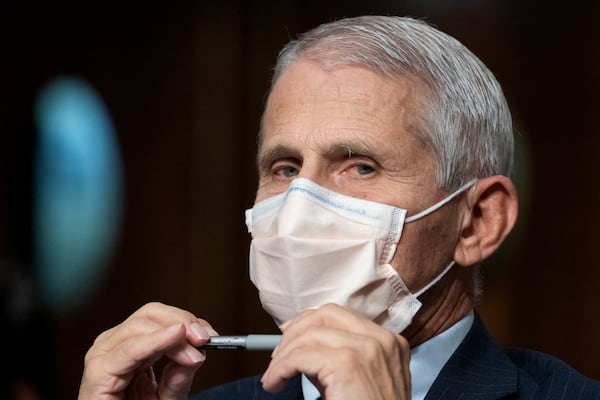 FILE - Dr. Anthony Fauci, director of the National Institute of Allergy and Infectious Diseases, listens during opening statements during a Senate Health, Education, Labor, and Pensions Committee hearing on Capitol Hill, Nov. 4, 2021, in Washington. (AP Photo/Alex Brandon, File)