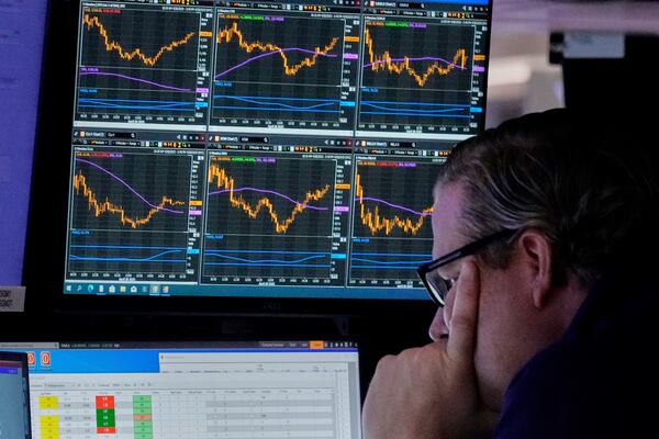 FILE - Specialist Gregg Maloney works at his post on the floor of the New York Stock Exchange, Monday, April 28, 2025. (AP Photo/Richard Drew, File)