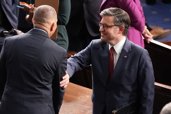 House Speaker Mike Johnson, R-La., right, speaks with House Minority leader Hakeem as the House of Representatives meets to elect a speaker and convene the new 119th Congress at the Capitol in Washington, Friday, Jan. 3, 2025. (AP Photo/Jacquelyn Martin)