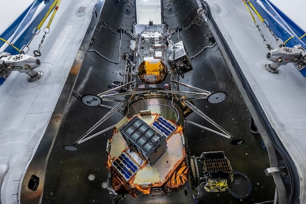 In this undated image released by NASA, Intuitive Machines’ newest lunar lander is seen attached to a SpaceX Falcon rocket. (NASA via AP)