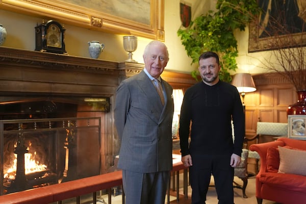 Britain's King Charles III and Ukrainian President Volodymyr Zelenskyy, right, pose for a picture during their meeting at the Sandringham Estate in Norfolk, England, Sunday, March 2, 2025. (Joe Giddens/PA via AP)