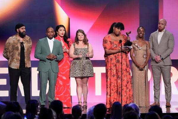 Arkie Kandola, from left, Chris Powell, Jaylee Hamidi, Michelle McLeod, Natasha Rothwell, Elle Lorraine and KeiLyn Durrel Jones accept the award for best ensemble cast in a new scripted series for "How to Die Alone" during the Film Independent Spirit Awards on Saturday, Feb. 22, 2025, in Santa Monica, Calif. (AP Photo/Chris Pizzello)